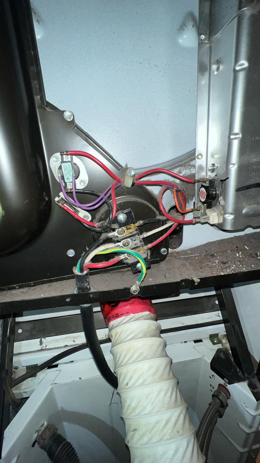 Kenmore electric dryer thermal fuse, high-limit thermostat, and control system wiring during safety diagnostic by Caspian Appliance Repair in Hamilton, Ontario